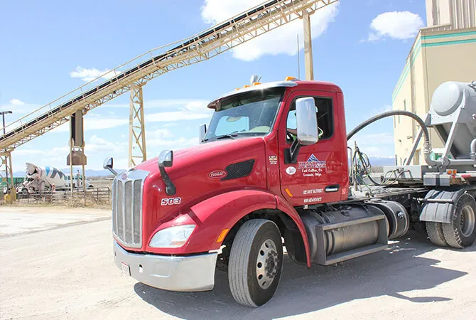 Red truck at an aggregate plant